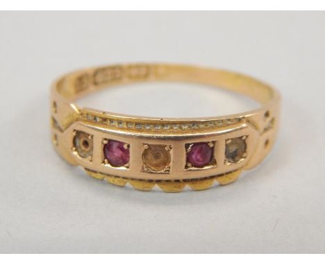 A Victorian 15ct gold dress ring, set with rubies and diamonds, 1.8g all in. 