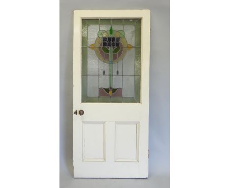 An Edwardian painted door, with an Art Nouveau style stained glass panel to the centre, brass fittings, etc., 204cm high, 92c
