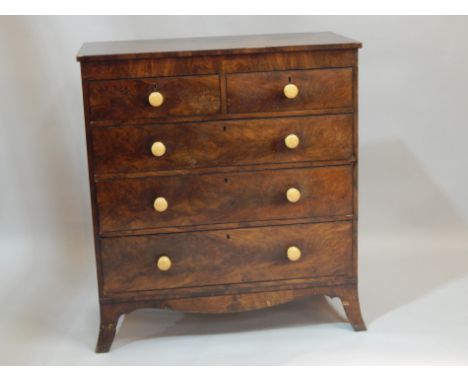 An early Victorian mahogany chest of two short and three long drawers, with ceramic handles, on splay legs, 104cm wide. 