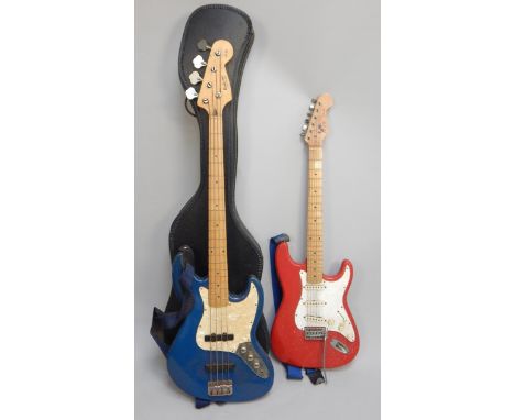 A Hohner Rockwood bass guitar, bearing the initial J.B.-'98, a Falcon by Tanglewood electric guitar, and a compact disc playe