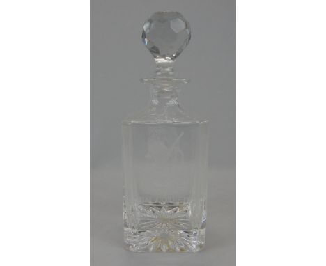 A square section glass decanter, with etched type decoration of Jim Corbett of Kumaon 1875-1955