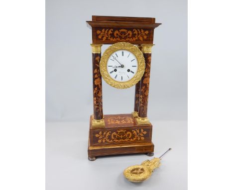 A 19thC French rosewood marquetry Portico type mantel clock, decorated overall with scrolls, flowers etc., the enamel dial si