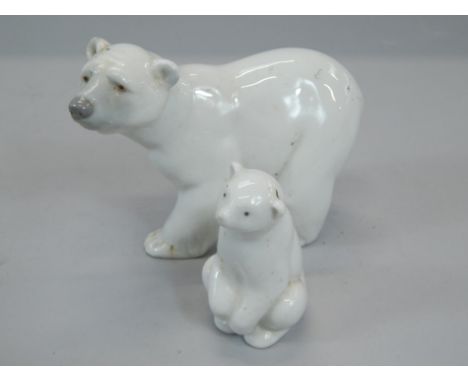 A Lladro porcelain Polar bear and a Nao small Polar bear.