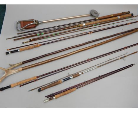 Various items of fishing equipment, walking sticks, ceramic turning wheel, etc.