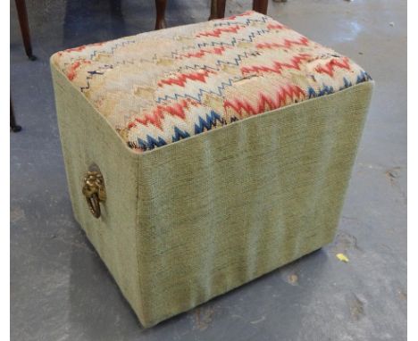 A Victorian stool, with brass lion mask handles, and a woolwork seat, 42cm wide.