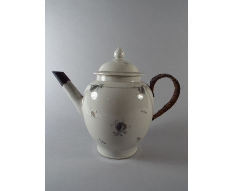 An Early Chinese Teapot with Wicker Handle and White Metal Spout.