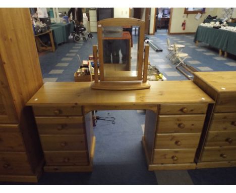A Pine Kneehole Dressing Table with Swing Mirror. 