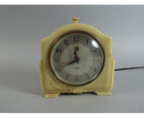 A White Bakelite Alarm Clock by Smiths (Sectric).