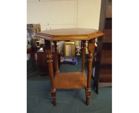 An Edwardian Octagonal Occasional Table with Stretcher Shelf.