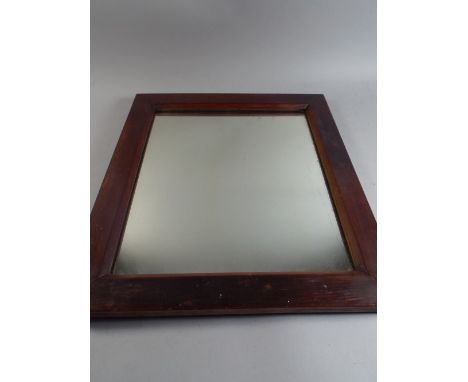 A Framed Rectangular Mirror. 
