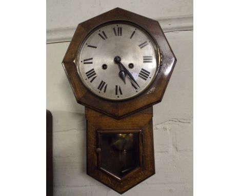 An Octagonal Drop Dial Wall Clock. 