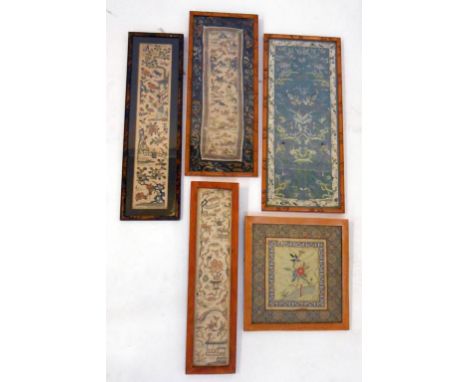A COLLECTION OF FOUR 19TH CENTURY CHINESE SLEEVE BANDS, each embroidered with figures or flower in landscapes within floral b