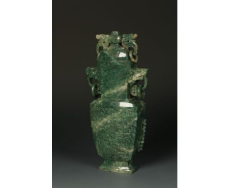 A CHINESE SPINACH JADE COVERED VASE, with carved archaistic decoration, 20th century, 10" high