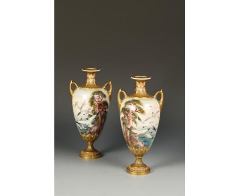 A PAIR OF LATE VICTORIAN ROYAL WORCESTER PORCELAIN VASES by Charles Baldwyn, of tapering ovoid form, with gilt handles and fe