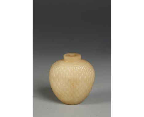 A CHINESE CELADON JADE SNUFF BOTTLE of tapering ovoid form, carved to simulate basket-weave, late Qing/Republic, 2.5" high