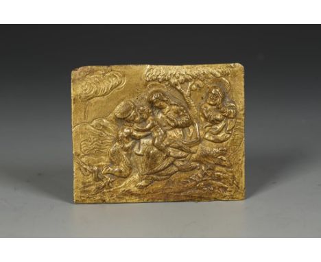 A RECTANGULAR GILT METAL ADORATION PANEL, worked with a scene of the holy family in a landscape, possibly Italian 16th centur