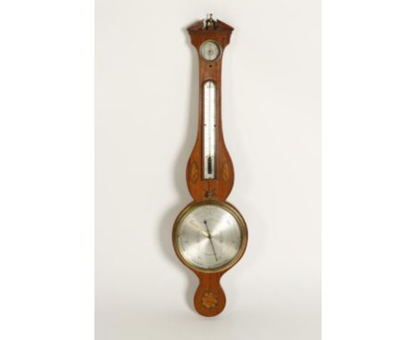 A GEORGE III MAHOGANY WHEEL BAROMETER, with architectural pediment above a dry/moist gauge, thermometer and broad silvered ba