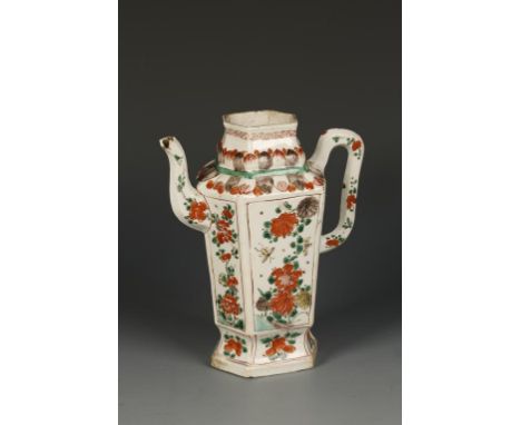 A CHINESE FAMILLE VERTE HEXAGONAL EWER decorated with panels of blossoming foliage, with a scroll handle and spout, Kangxi, 6