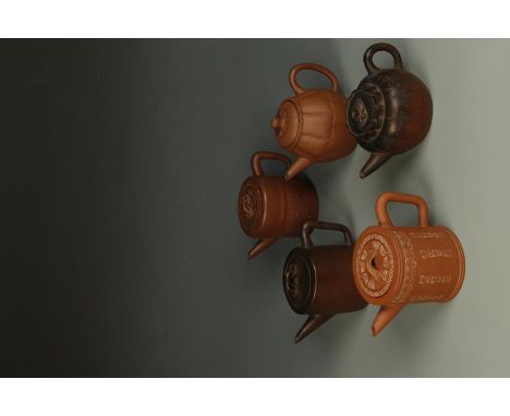 FIVE CHINESE YIXING TEAPOTS, one of petal form, signed "Ling Shun", 20th century, 6" long; three cylindrical example, one sig
