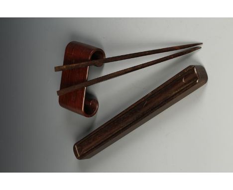 A PAIR OF CHINESE HONGMU CHOPSTICKS AND A STAND, the chopsticks in a fitted case, probably Republic period, 9.5" long; the st