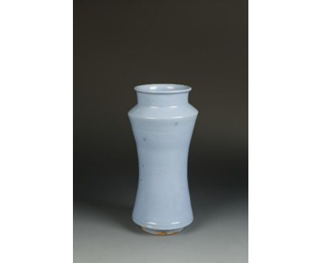 A SPANISH POTTERY ALBARELLO VASE of waisted cylindrical form with blue glaze, 18th century, 10.75" high  Provenance: The Coll