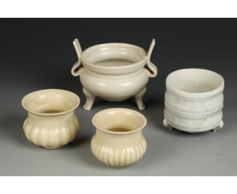 A GROUP OF FOUR CHINESE QINGBAI STYLE CENSERS, the largest example with flattened scroll handles, 5.5" across; another of cyl