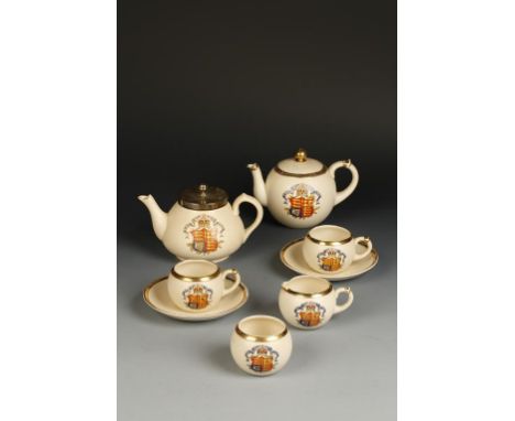 A MACINTYRE BURSLEM TEA SERVICE painted with armorials to commemorate the Diamond Jubilee of Queen Victoria, each with printe