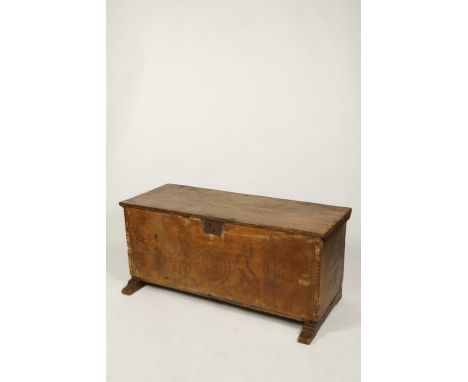 AN ITALIAN CHARLES I CEDAR WOOD COFFER with a rising lid above a carved front panel with shallow incised decoration with a ce