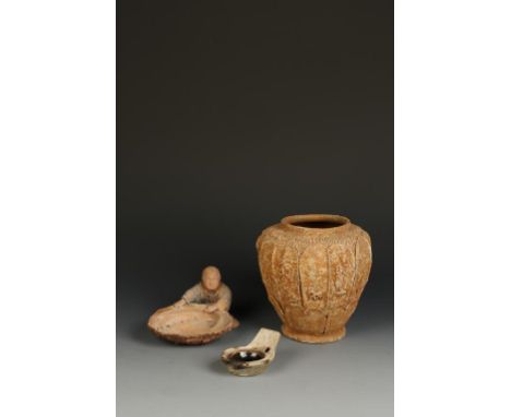THREE CHINESE EARTHENWARE VESSELS including a Tang style jar modelled in the form of a lotus with figure decoration, 7.5" hig