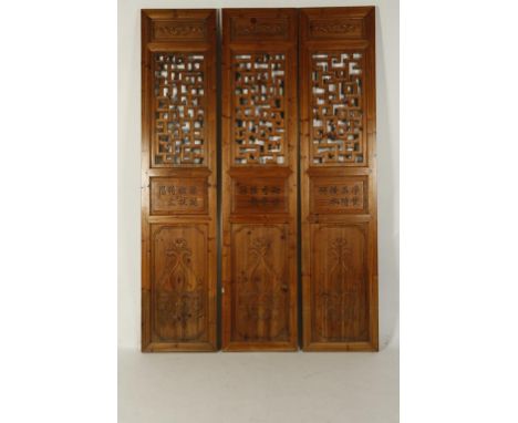 A SET OF FOUR CHINESE SOFTWOOD ARCHITECTURAL PANELS, each with an open archaic scroll section above incised calligraphy and a