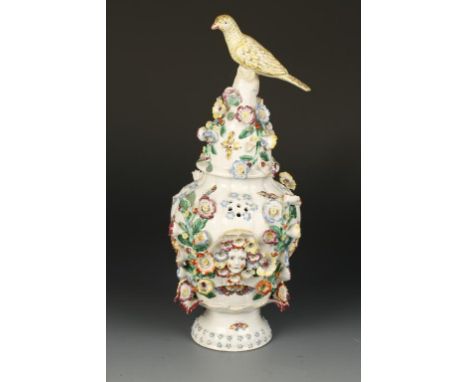 AN 18TH CENTURY BOW POT POURRI VASE AND COVER enamelled in polychrome with butterflies, insects and foliage, the lobed body a