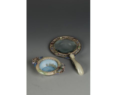 A CHINESE JADE, SILVER AND ENAMEL MAGNIFYING GLASS AND BOWL, the magnifying glass with a dragon garment-hook handle, 7.5" lon