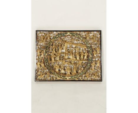 A CHINESE GILTWOOD OPENWORK PANEL, the central rounded decorated with figures and musicians, within a border of further figur