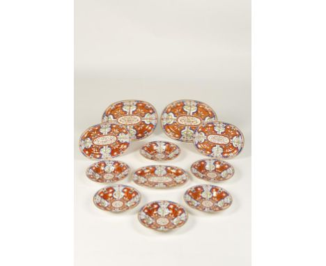 A REGENCY SPODE TYPE PORCELAIN PART DINNER SERVICE comprising two large meat plates and three smaller, and nine bowls, decora