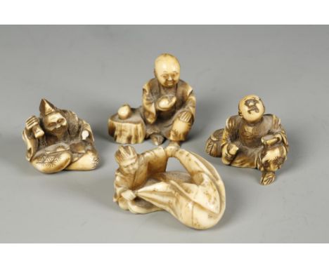 FOUR JAPANESE IVORY NETSUKE including a man holding a sack, and three smaller figures seated at work, Meiji, 1" - 1.5" (4)