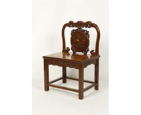 A CHINESE HONGMU SIDE CHAIR, the shield-shaped splat with relief-carved vases beneath a dragon-scroll top rail, Qing, 19th ce