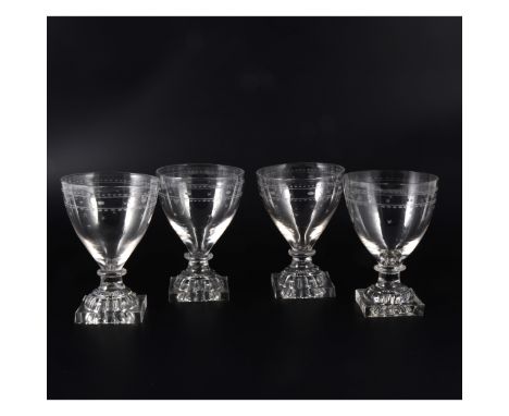A near set of twelve George III rummers, incurved bowls, engraved with star and bead motifs, each with a colour above a rudim