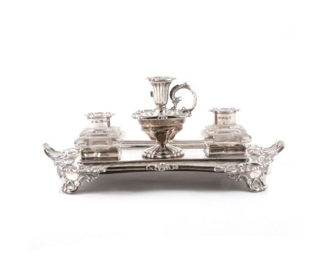 Silver desk stand by Henry Wilkinson &amp; Co, London 1835, two detachable glass inkwells and taperstick, the stand with cast