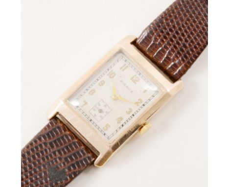 Pierce - A gentleman's 9 carat yellow gold wrist watch, rectangular champagne arabic dial with subsidiary seconds dial in a 9