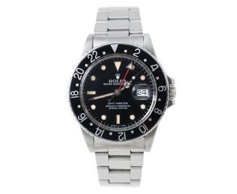 Rolex - A gentleman's Oyster Perpetual Date GMT-Master wrist watch, circular black 29mm dial with triangular, baton and dot l