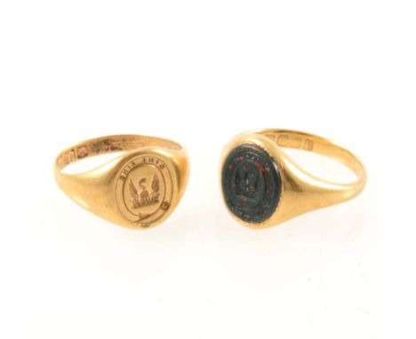 Two small 18 carat yellow gold signet rings with McGill crest, one set with a bloodstone, both intaglio carved with a crest "