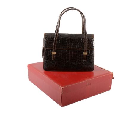 Cartier - a vintage patent crocodile finish handbag, fold-over top with twin short handles having gilt retainers to front, br