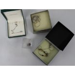 Selection of silver necklaces and pendant