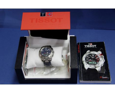 A Tissot T Touch Z253/353 titanium gentleman's wristwatch, boxed, with instruction book and spare links.