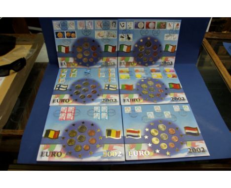 Twelve Benham 2002 uncirculated eight Euro coin sets on first day covers, one for each of the twelve countries that adopted t