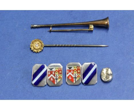 A 15ct gold hunting horn brooch; together with a 15ct gold stick pin 8.6g total; a pair of silver and enamel crested cufflink