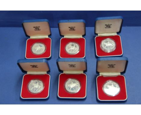 Six cased Royal Mint 1977 silver Jubilee proof crowns.