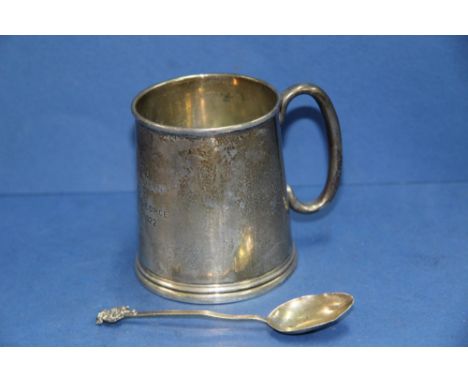 A silver christening mug, by Alexander Clarke & Co Ltd, Birmingham 1921, 7.5cm, and a teaspoon, 104g.