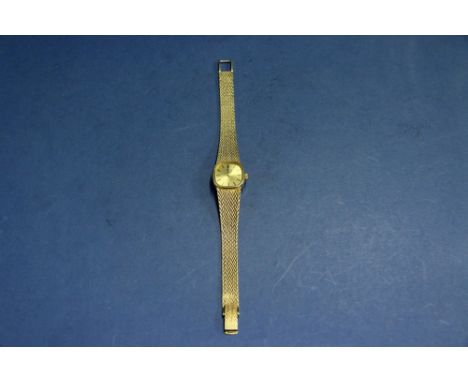 A 1970's Longines 18ct gold ladies manual wristwatch, movement cal 817.4, case no 18744504, on attached 14k gold mesh bracele