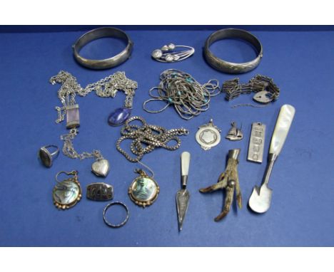 A selection of silver jewellery and other items.